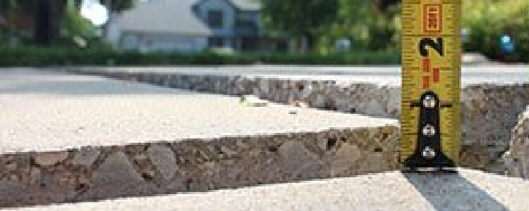 dangerously unlevel concrete before repair