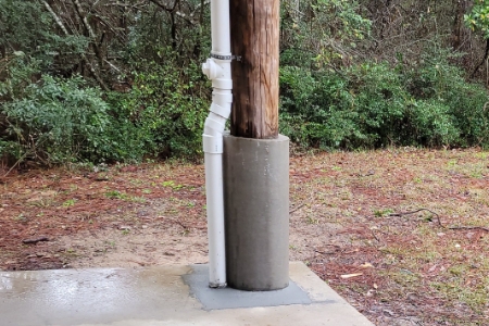 Stable and secure wood pile for a costal home by MDH Foundation Repair